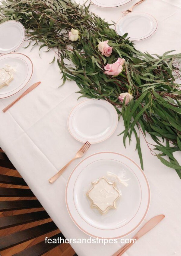 green floral DIY table runner with greens and roses