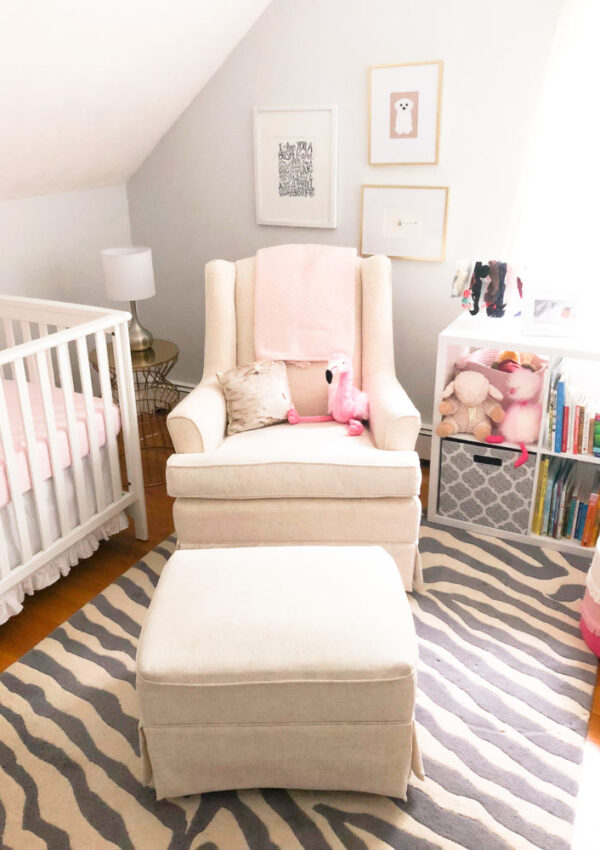 pink and gray baby girl nursery, small space nursery | Pink and Gray Nursery decor ideas featured by popular Boston life and style blogger, Feathers and Stripes