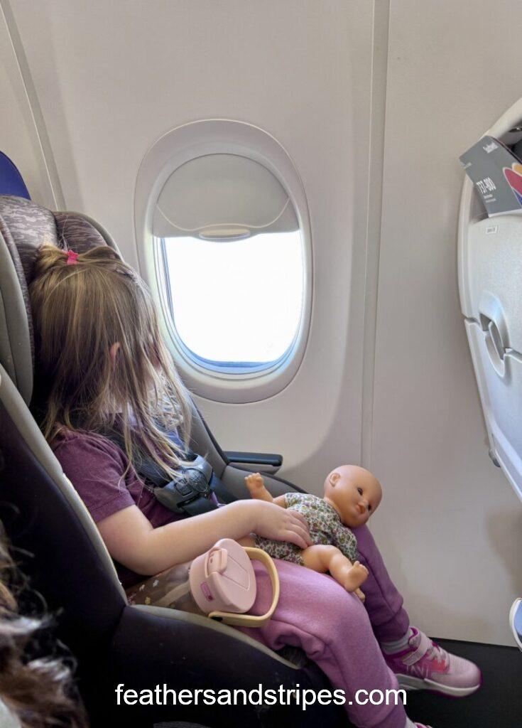 Cosco Scenera car seat on airplane